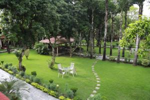 Κήπος έξω από το Hotel Parkland