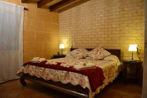 Postel nebo postele na pokoji v ubytování Agroturismo Es Gallicant + 37 fotografií