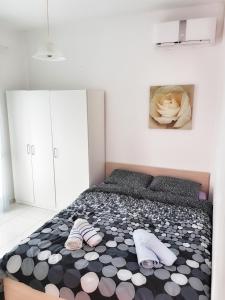 Posteľ alebo postele v izbe v ubytovaní Stavrini's House