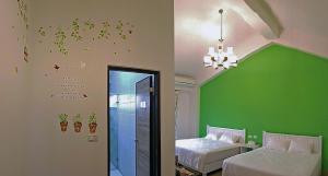 Postel nebo postele na pokoji v ubytování Taroko Formosa Homestay