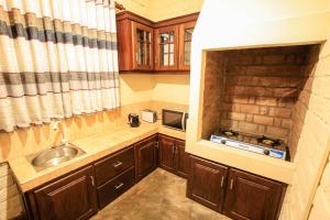Kuchyň nebo kuchyňský kout v ubytování Amazing Villa + 37 fotografií