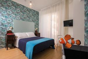 Postel nebo postele na pokoji v ubytování Hotel Trafalgar