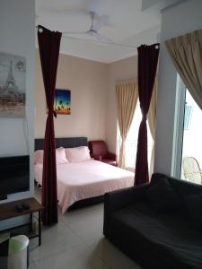 מיטה או מיטות בחדר ב-888@D'Perdana Sri Cemerlang