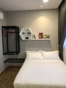 Postel nebo postele na pokoji v ubytování W boutique 10pax with family karaoke
