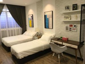 Postel nebo postele na pokoji v ubytování W boutique 10pax with family karaoke