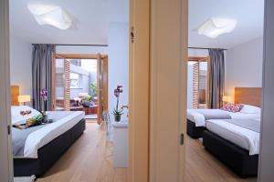 Postel nebo postele na pokoji v ubytování Luxury Apartment Kampanel