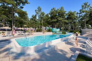 a rendering of a swimming pool at a resort at Valamar Camping Ježevac in Krk +39 photos
