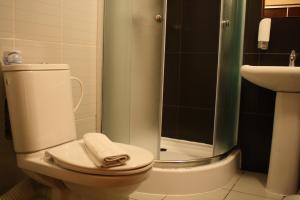 Koupelna v ubytování Garni Hotel Cosmopolitan