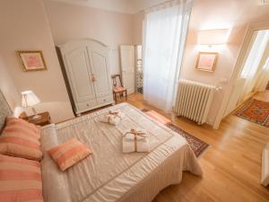 フィレンツェにあるKalypsoのベッドルーム1室(ベッド1台、プレゼント2つ付)
