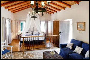Postel nebo postele na pokoji v ubytování Glyfada Beach Villas