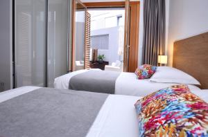 Postel nebo postele na pokoji v ubytování Luxury Apartment Kampanel