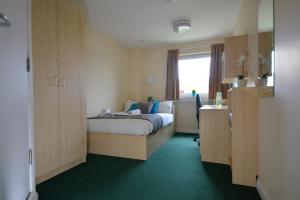 Ένα ή περισσότερα κρεβάτια σε δωμάτιο στο Newport Student Village (Campus Accommodation)
