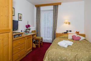 Postel nebo postele na pokoji v ubytování Hotel Bellavista