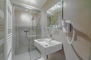 Koupelna v ubytování TGM Hotel Residence