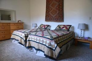 Кровать или кровати в номере Harmony Belle at Kolob Canyon