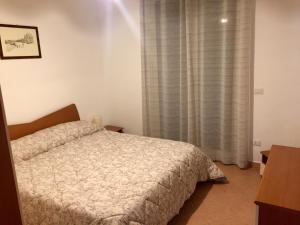 Postel nebo postele na pokoji v ubytování "casa le Palme"