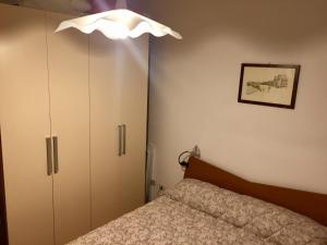 Postel nebo postele na pokoji v ubytování "casa le Palme"