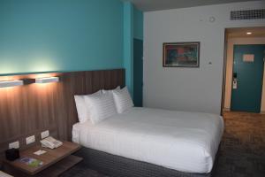 Postel nebo postele na pokoji v ubytování Holiday Inn - Lima Airport by IHG