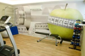 Academia e/ou comodidades em Ímpar Suítes Expominas