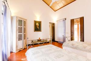 Posteľ alebo postele v izbe v ubytovaní IKSHAA Luxury Villa with Private Pool