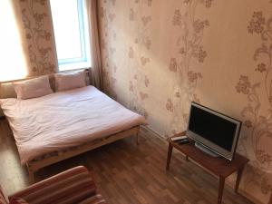 
Кровать или кровати в номере Kvartira on Pereulok Sadovy 9
