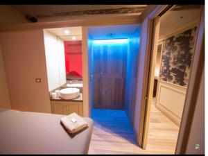 Postel nebo postele na pokoji v ubytování Anfiteatro B&B