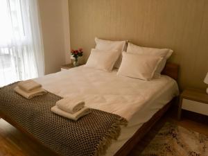 Posteľ alebo postele v izbe v ubytovaní New Stylish Apartment