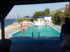 
The swimming pool at or near Haritos Hotel - Geothermal Hot Swimming Pool
