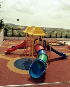 a playground with several slides and slidesktop at Non Smoking Theda Evo Soho Bangi with Coway & Wifi - Pool Tutup in Bangi