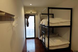 Voodi või voodid majutusasutuse F Plus F Hostel toas