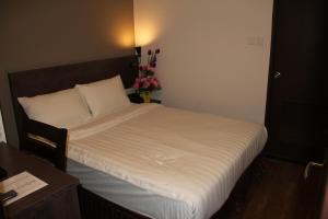 Katil atau katil-katil dalam bilik di KL Hotel