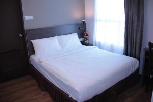Katil atau katil-katil dalam bilik di KL Hotel