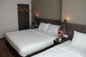 Katil atau katil-katil dalam bilik di KL Hotel