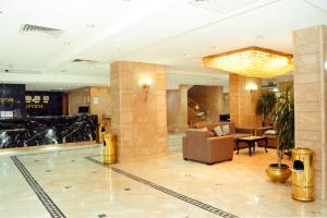 Area soggiorno di Gawharet Al Ahram Hotel
