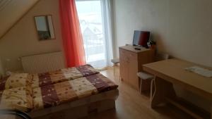 Postel nebo postele na pokoji v ubytování Privat Luptak