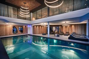 Bazén v ubytování Hotel Stoeres - Active wellbeing nebo v jeho okolí