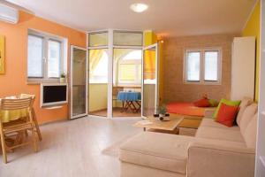 TV a/nebo společenská místnost v ubytování Apartment Lemon & Soul