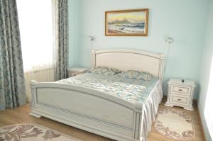 Llit o llits en una habitació de Zatishok