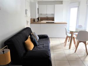 Kuchyň nebo kuchyňský kout v ubytování La coquille