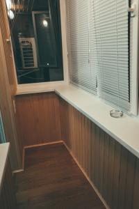 a room with a window and a wooden floor at Prime Home in Chernihiv +2 photos