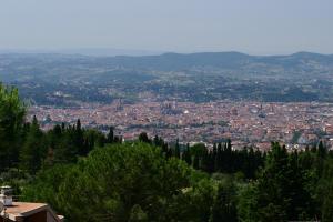 a large city with trees and buildings at Camping Village Panoramico Fiesole in Fiesole