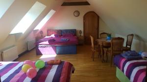 Postel nebo postele na pokoji v ubytování Peahen Residence