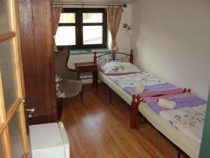 Postel nebo postele na pokoji v ubytování Penzion Večerka