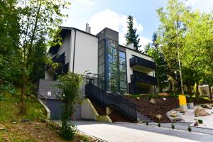 Zahrada ubytování Apartament Szarotka - Apartamentuj