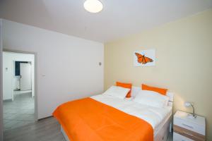 Posteľ alebo postele v izbe v ubytovaní Roze Apartment