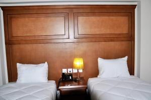 Voodi või voodid majutusasutuse Cleopatra Hotel toas
