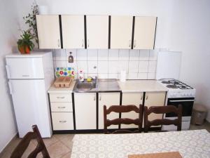 Kuchyňa alebo kuchynka v ubytovaní Apartment Gobov