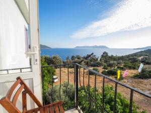 a balcony with a view of the ocean at Hideaway in Kas