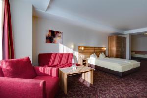 Postel nebo postele na pokoji v ubytování Ferien Hotel Rennsteigblick