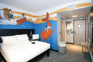 Postel nebo postele na pokoji v ubytování ibis Styles Genève Carouge